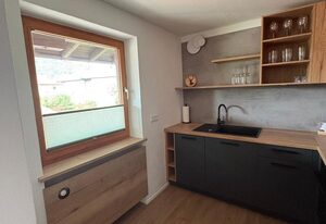 Chalet Lilly inkl. Chiemgaukarte – Chalet Lilly, Terrasse mit Garten, 3 Schlafzi., 1 Wohnzi., Kamin, Bad/WC, max. 6 Pers.