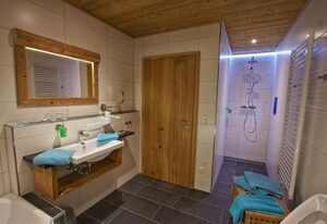 Holzhaus Lugerhof – Ferienwohnung Holzwurzel