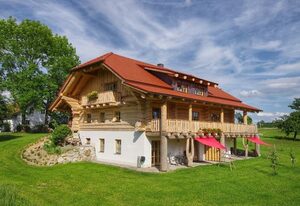Holzhaus Lugerhof – Ferienwohnung Holzwurzel