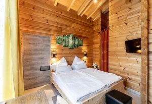 Blockhaus am Baumwipfelpfad – kleine Ferienwohnung - Spechthöhle