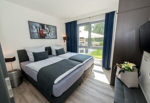 Wohnen auf Zeit: Garten-Wohnung - barrierefrei, ruhig, mit Parkplatz und nahen Einkaufsmöglichkeiten