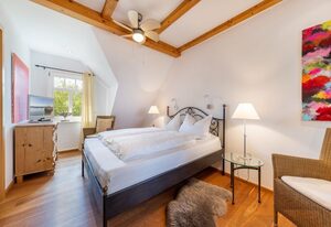 Ferienwohnung - Rügenbrise mit Seeblick mit 3 Bädern, Steg und Paddelboot - alle inklusive