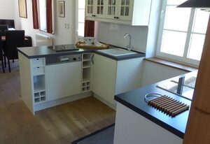 Gut Rattelvitz Parterre C, hochwertig, Sauna, Kamin, eTankstelle, Spielscheune, 15.000qm Parkland