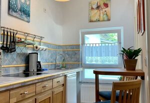 Villa Rosengarten - Ferienwohnung Baumhaus mit Seeblick
