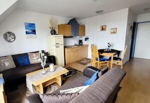 Ferienwohnung Boddenblick - Balkon und Wasserblick – Ferienwohnung Boddenblick: Ihr Rückzugsort in Breege mit Blick auf den Bodden