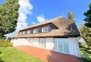Ferienwohnung Drachen - Wasserblick in Traumlage – Ferienwohnung Drachen: Reetgedecktes Strandhaus mit eigenem Strand und Meerblick