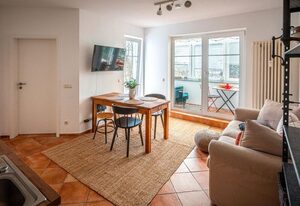 Villa Tizian -  Ferienappartement Hygge – 3-Raum-Appartement "Hygge" mit Balkon und Wintergarten