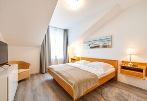 Ferienappartement Stranddüne in der Villa A Capella in Binz – Villa A Capella in Binz - Ferienappartement Stranddüne, Schwimmbad, Strandkorb