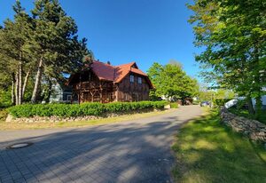 Windhuus – Fachwerk-Charme am Wieker Bodden – Windhuus–Exklusives Fachwerkhaus am Wieker Bodden mit Sauna und Leuchtturm-Blick
