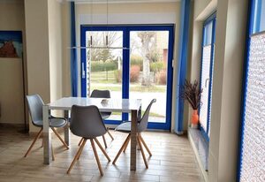 Ferienwohnung Ostrea Breege - mit Garten und Grill – Moderne Ferienwohnung mit Terrasse nahe Strand & Hafen in Juliusruh