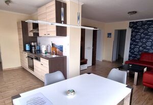 Ferienwohnung Ostrea Breege - mit Garten und Grill – Moderne Ferienwohnung mit Terrasse nahe Strand & Hafen in Juliusruh