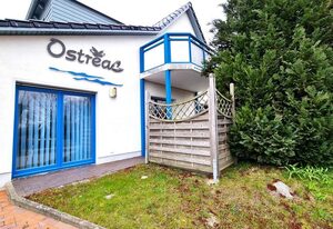 Ferienwohnung Ostrea Breege - mit Garten und Grill – Moderne Ferienwohnung mit Terrasse nahe Strand & Hafen in Juliusruh
